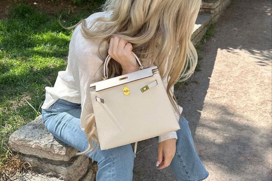 top handle bag with shoulder strap styled for casual outfit