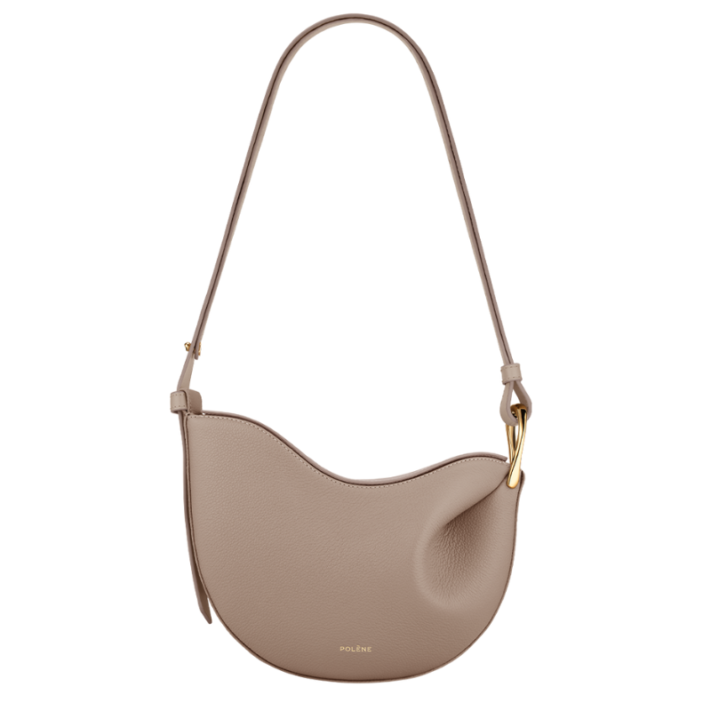 Beige leather crescent shoulder bag with adjustable shoulder strap