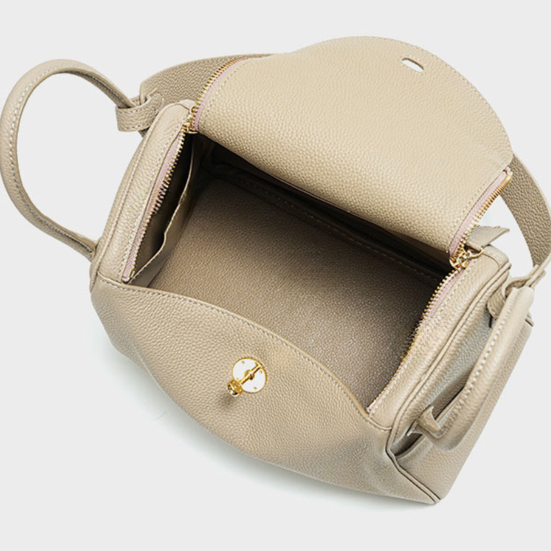 Genuine Leather Cat Eye Decorated Crossbody Shoulder Handbag Taupe color showing the interior from the top