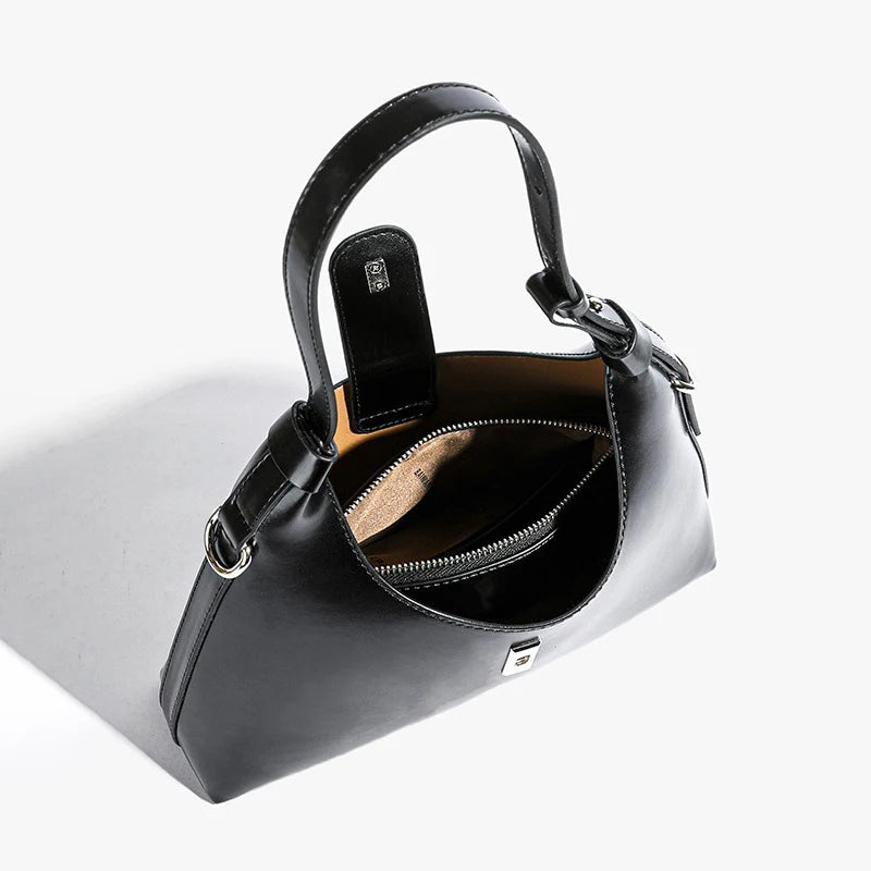 Genuine Leather Lock Single Shoulder Tote Bag In Black color showings the interior