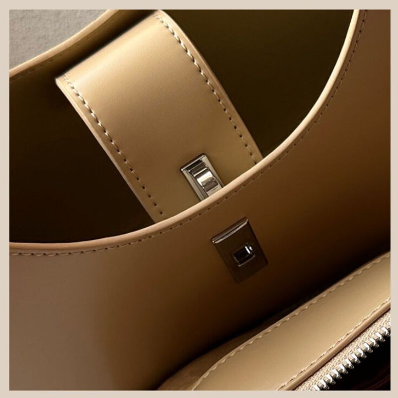 Genuine Leather Lock Single Shoulder Tote Bag In Brawn color showings the interior