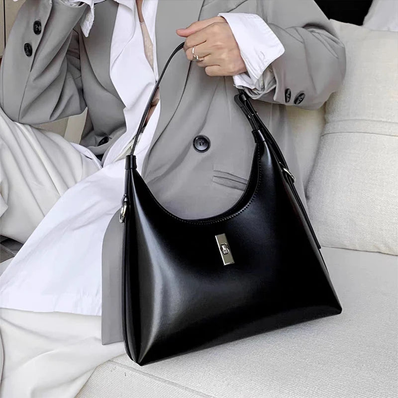 Genuine Leather Lock Single Shoulder Tote Bag In black color lifestyle