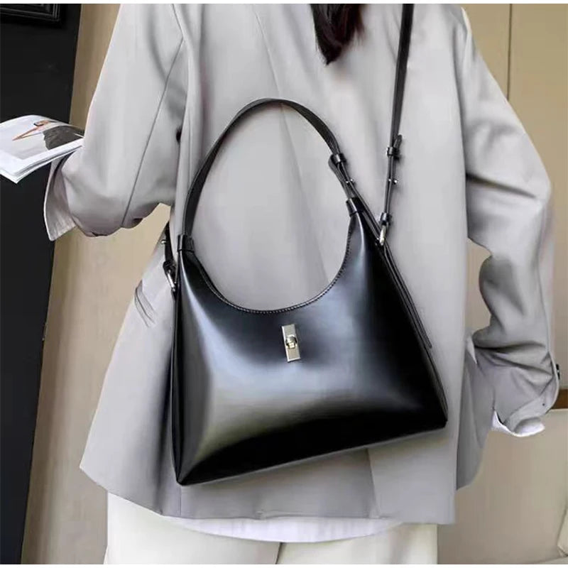 Genuine Leather Lock Single Shoulder Tote Bag In black color lifestyle crossbody