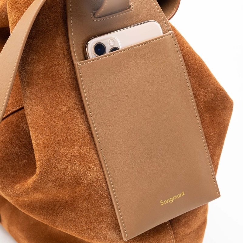 Genuine Leather Shoulder Bucket Bag Caramel color showing the side pocket