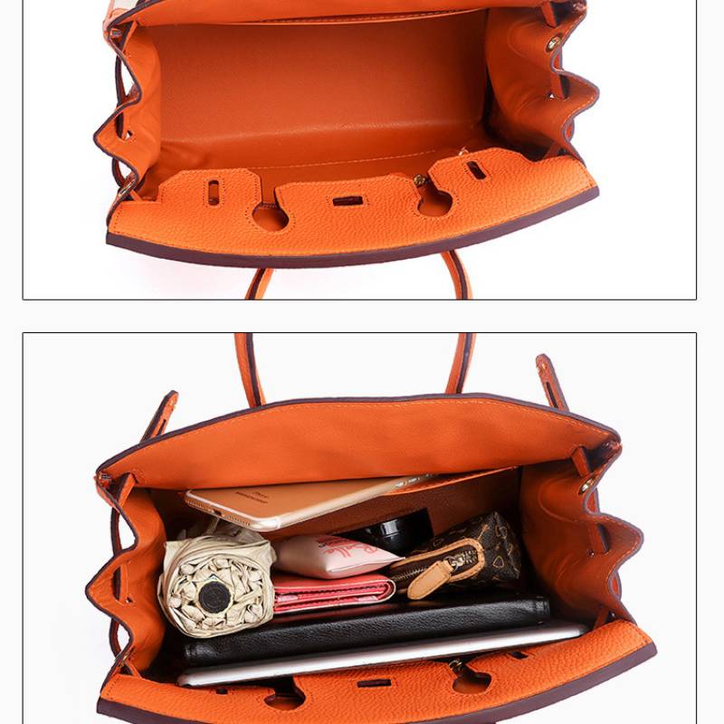 Interior compartment of structured leather canvas top handle bag with organized space