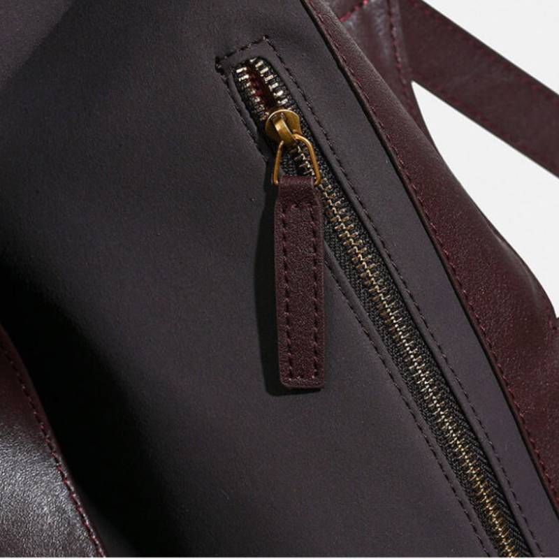 Interior zippered pocket inside soft leather tote bag for daily use for women