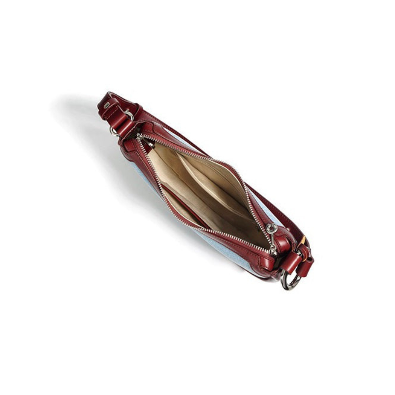 Leather crescent crossbody bag interior storage compartment