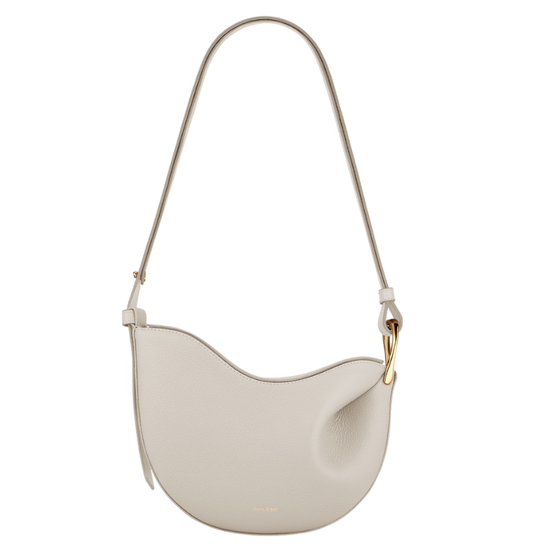 Light beige genuine leather crescent shoulder bag for everyday use