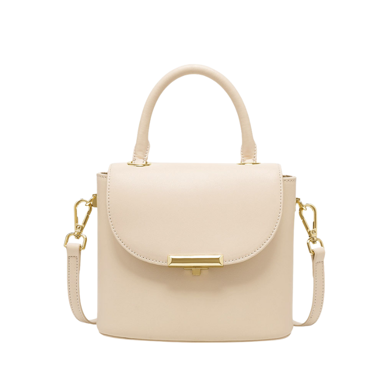 Lock buckle handbag in milk white genuine leather with top handle and crossbody strap