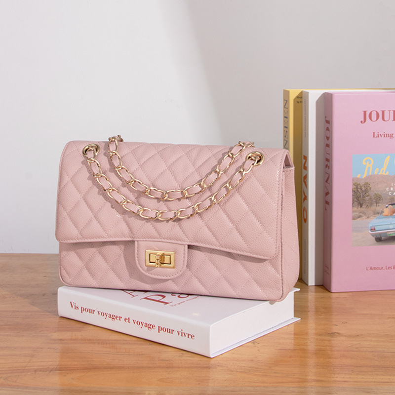 Quilted Genuine Leather Chain Strap Flap Bag with Lock Closure in Cavern Pink color lifestyle