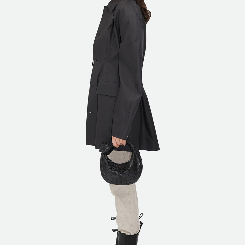 Quilted Leather Zipper Handbag In Black Held as a top handle bag
