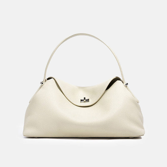 Small leather hobo bag in off-white top-grain leather with silver clasp — front view
