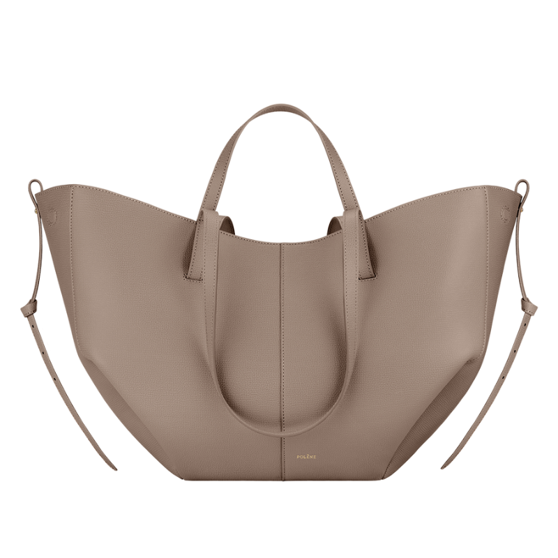 Soft leather tote bag detail showing curved shape and smooth finish