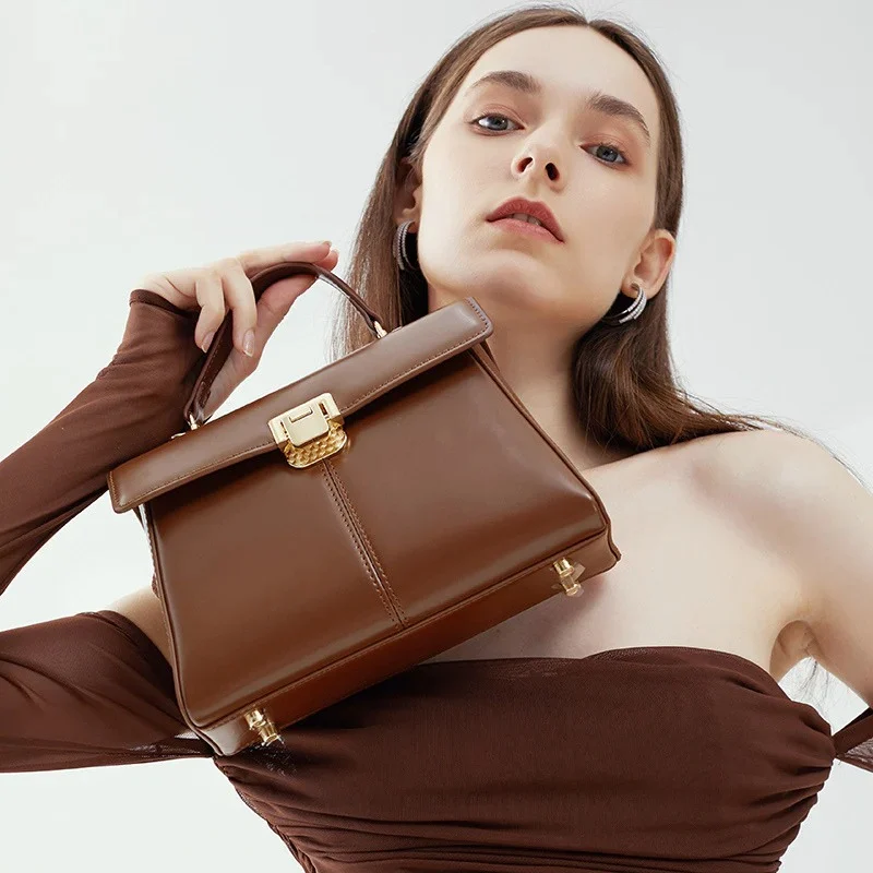 Top Handle Crossbody Genuine Leather Bag with Lock Closure in dark brown color lifestyle