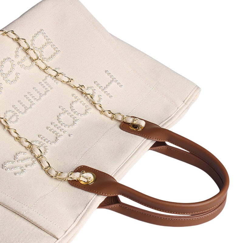 Women’s Beige Canvas Pearls Large Beach Tote showing deatils of the bag