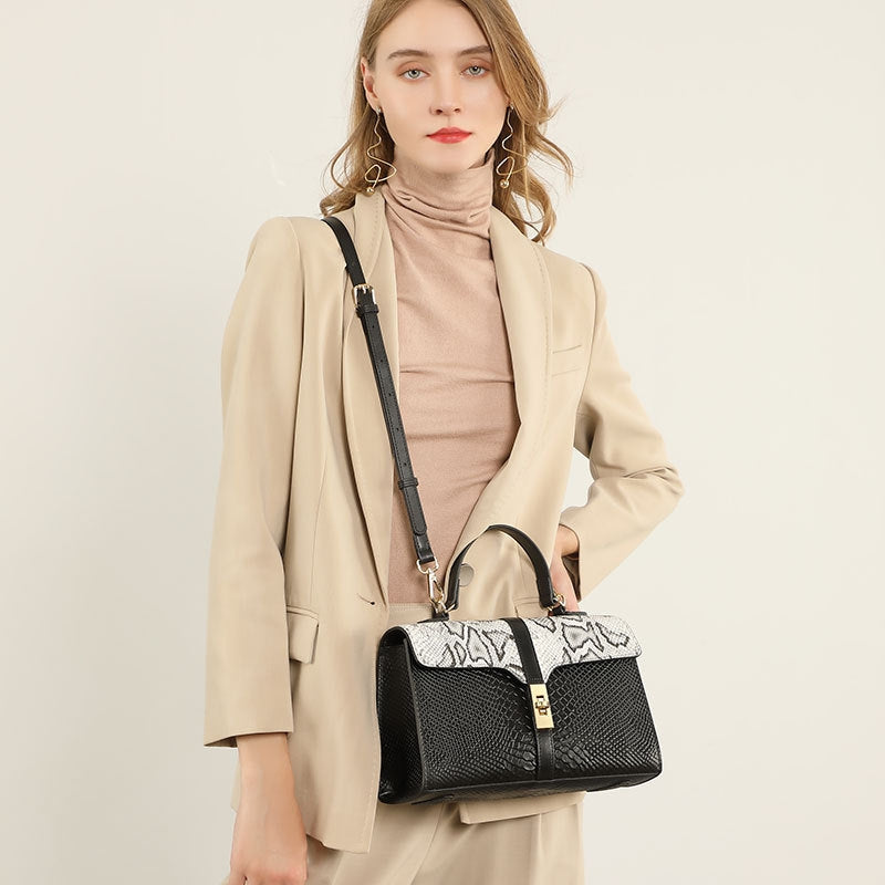 Women’s Genuine Leather Crocodile Crossbody Messenger Bag with Handle in ivory color lifestyle model wearing it as a crossbody bag