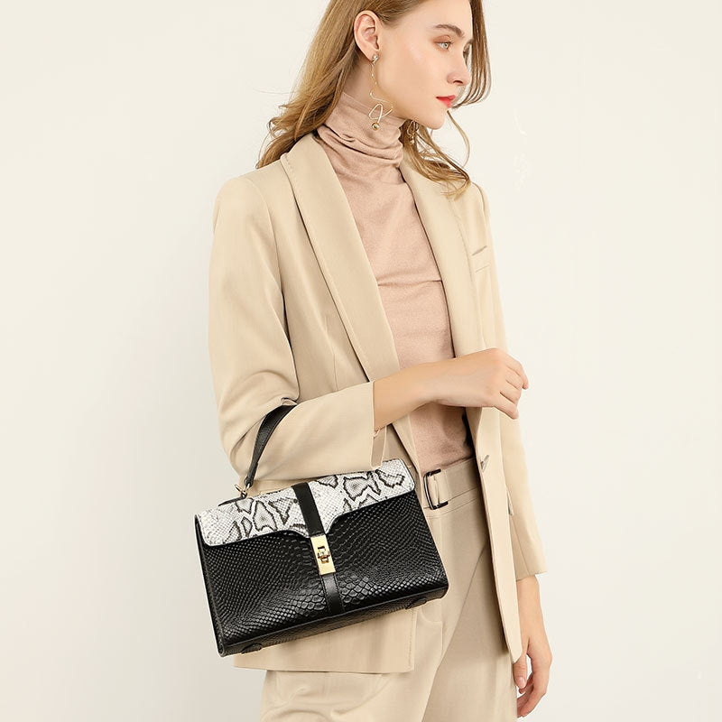 Women’s Genuine Leather Crocodile Crossbody Messenger Bag with Handle in ivory color lifestyle model wearing it as a top handle bag