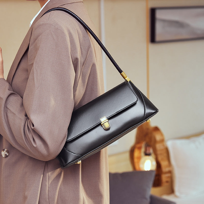 Women’s Genuine Leather Minimal Baguette Bags in black color lifestyle model carry it 