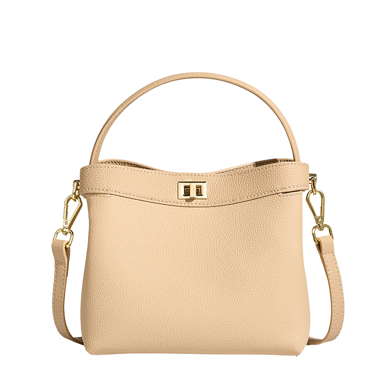 Women’s Genuine Leather Minimalist Lock Clasp Shoulder Bucket Bag in Cashmere color from the front