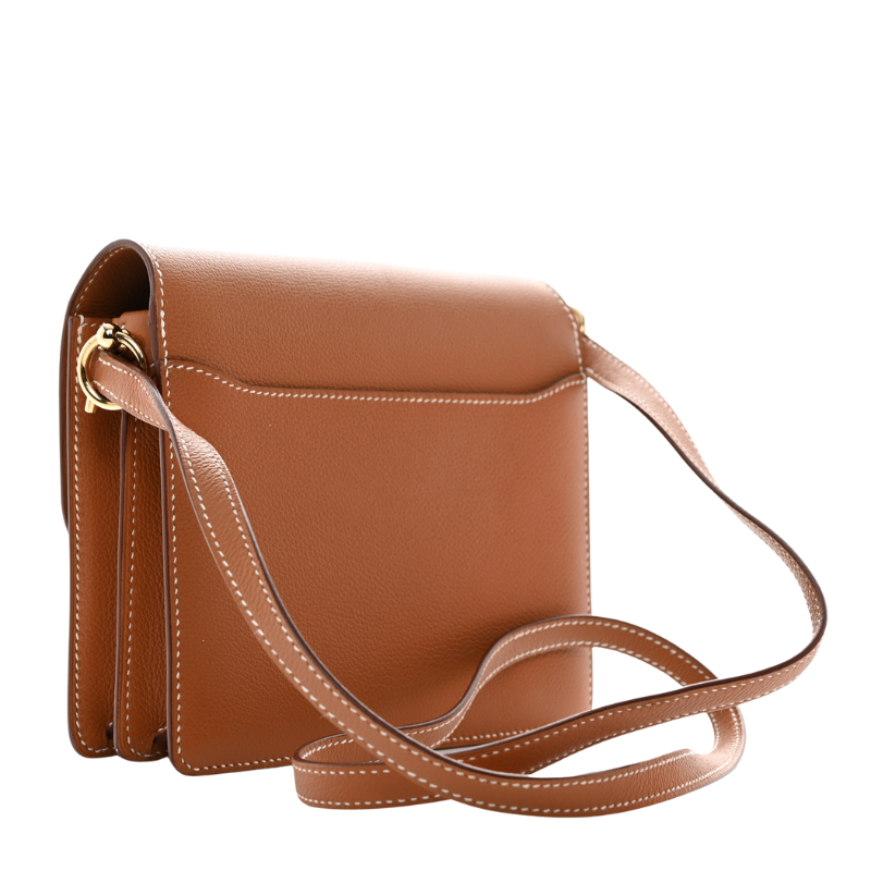Women’s Genuine Leather Pig Nose Lock Buckle Crossbody Bag in camel color from the back of the bag