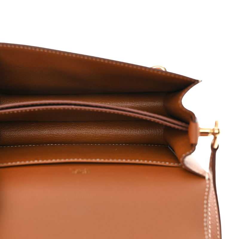 Women’s Genuine Leather Pig Nose Lock Buckle Crossbody Bag in camel color showing inside the bag