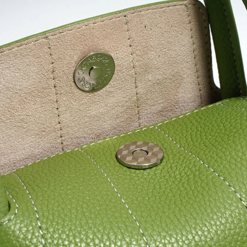 Women’s Mini Genuine Leather Minimalist Yuanbao-Shaped Tote Bag in avocado color showing details of the bag inisde of it