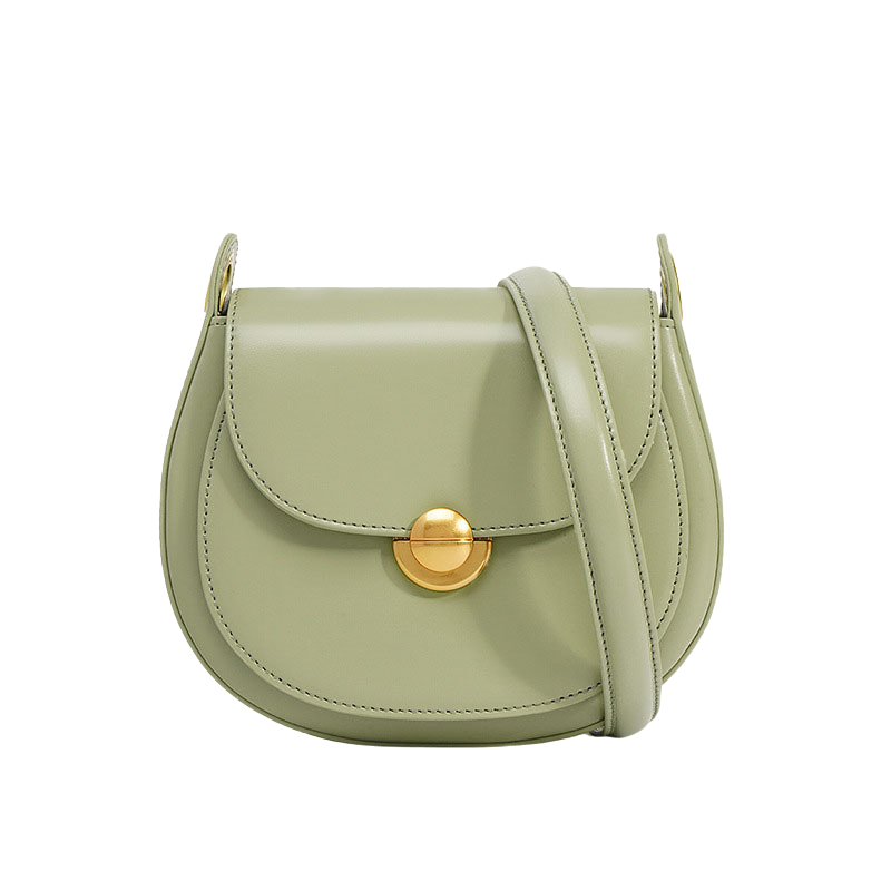 Women’s Minimalist Genuine Leather Lock Buckle Crossbody Saddle Bag in light green color from the front