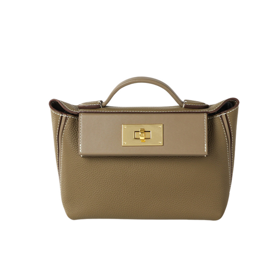 Women’s Minimalist Genuine Leather Lock Closure Top Handle Bag in elephant Grey color from the front