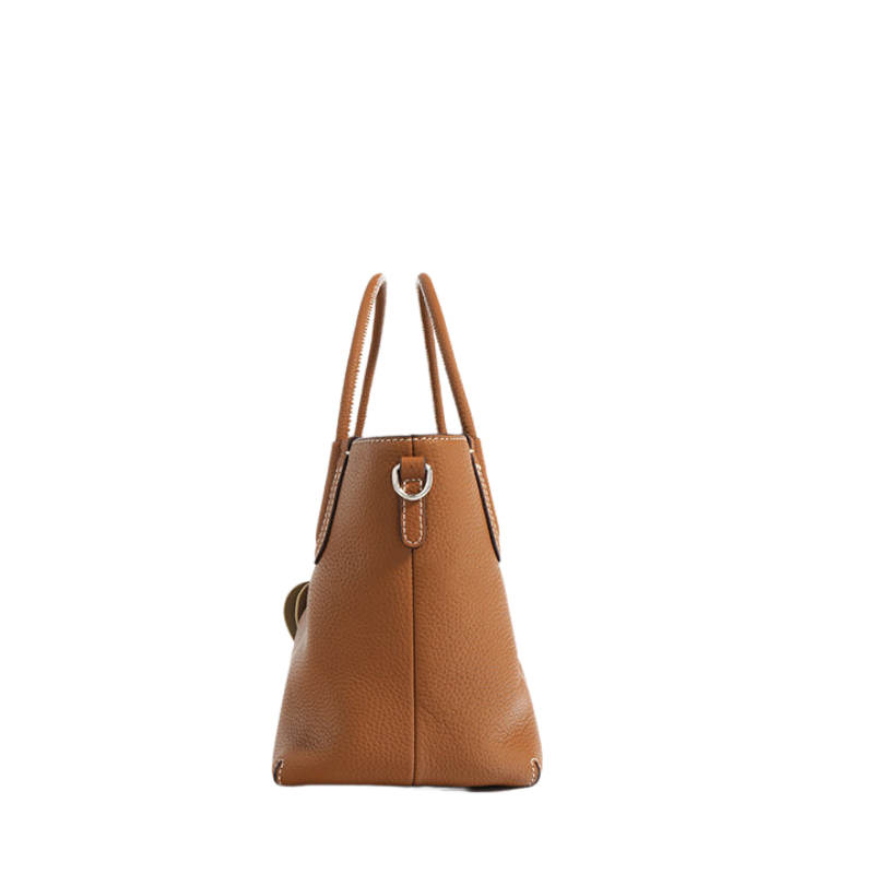 Women’s Minimalist Genuine Leather Shoulder Bucket Bag in camel color showing the it from the side