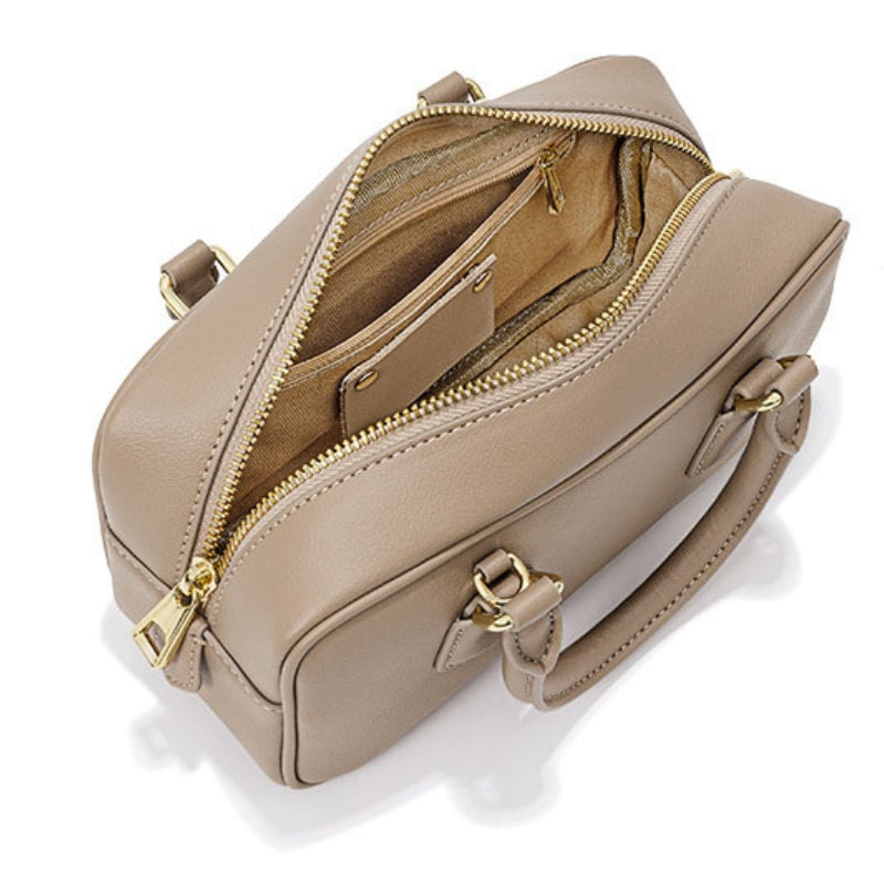 Women’s Minimalist Genuine Leather Zip Closure Boston Handbag in milk apricot color showing inside the bag