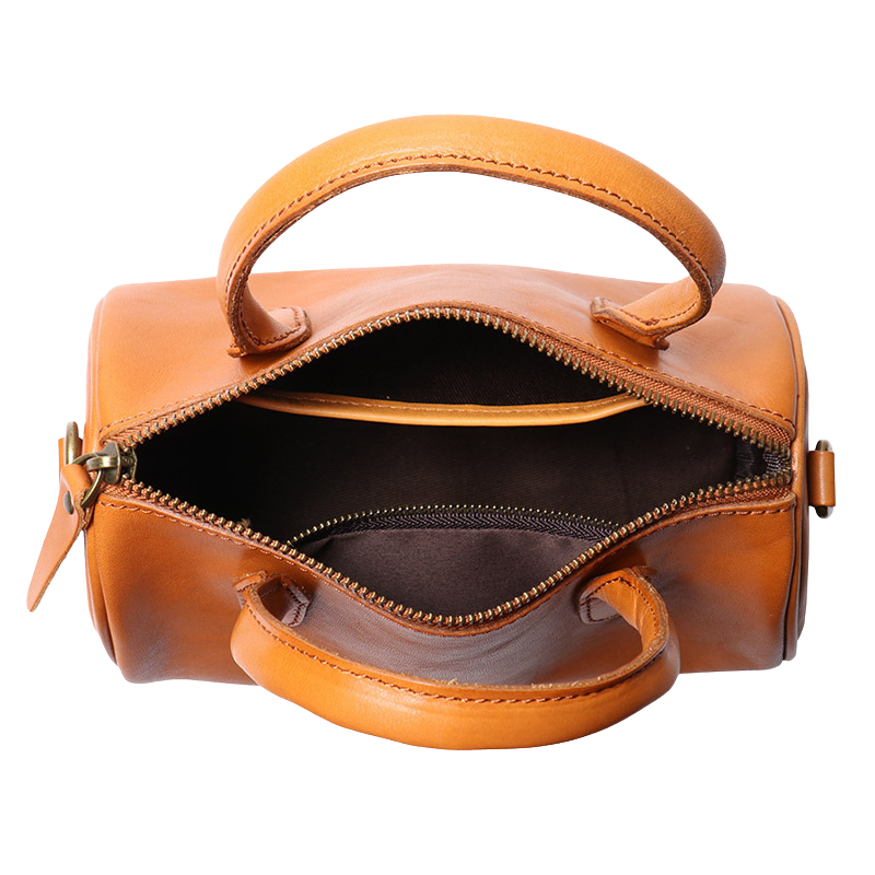 Women’s Vintage Genuine Leather Cylindrical Handbag in Sunset Yellow color showing inside the handbag Women's Soft Leather Tote Handbags | Luxury Green Leather Handbags 