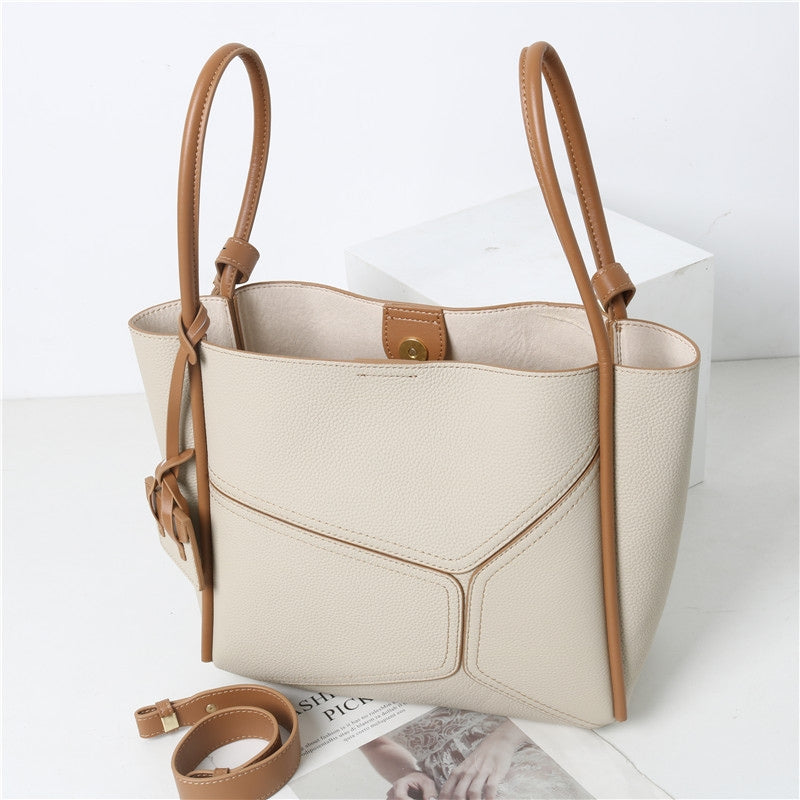 Women’s Vintage Genuine Leather Geometric Stitching Bucket Tote Bag in Antique White color lifestyle from the front