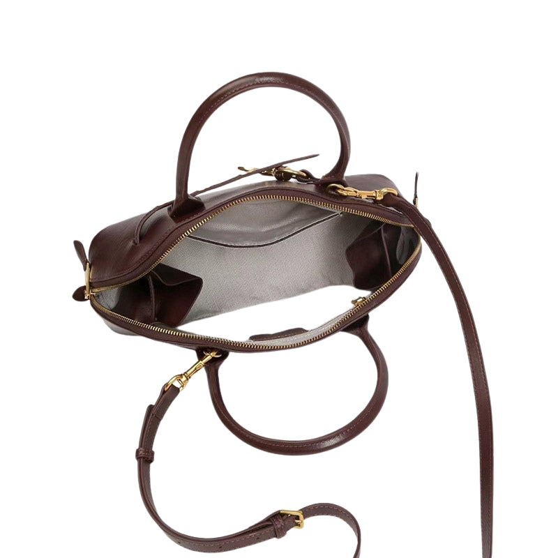 Women’s Vintage Genuine Leather Shell-Shaped Top Handle Bag in Crater Brown color showing inside the bag