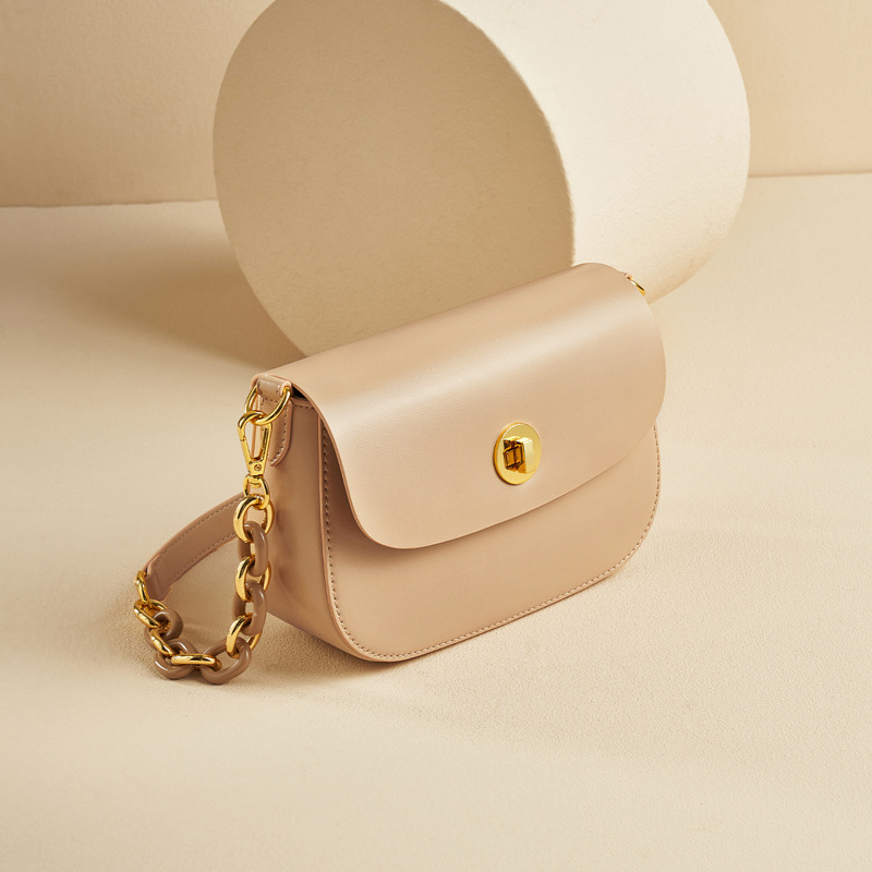 Women’s Vintage Minimalist Genuine Leather Lock Chain Crossbody Shoulder Bag in sorrell brown color from the side