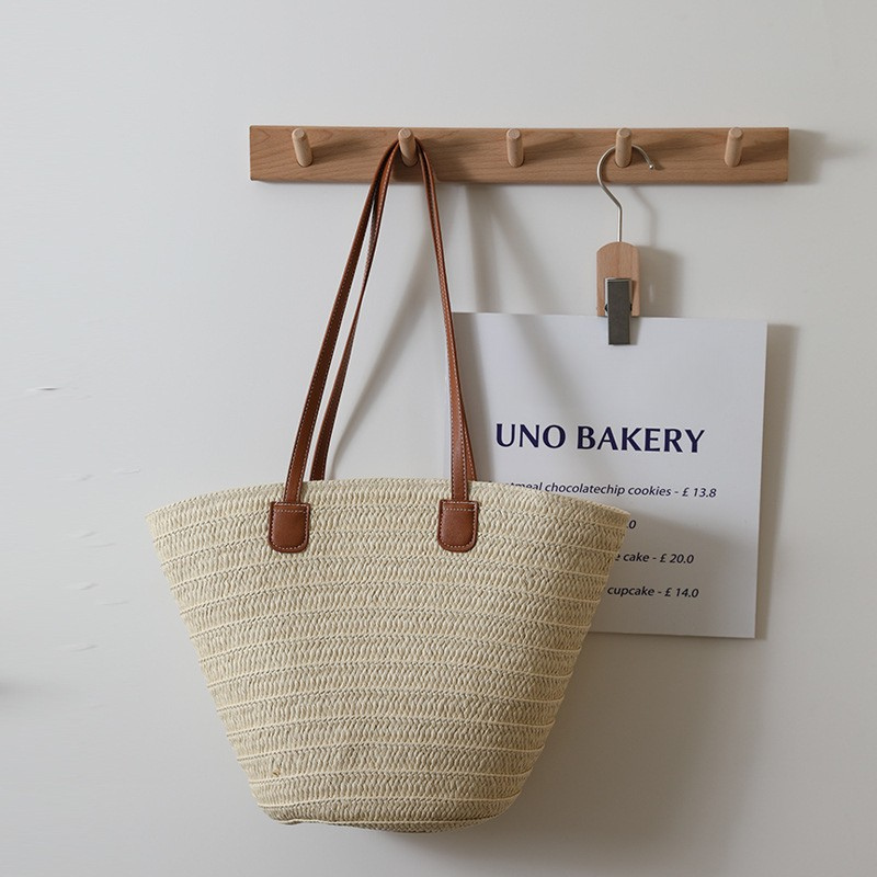 Women’s Woven Straw Beach Tote Bag with Large Capacity in sandrift color  lifestyle from the front