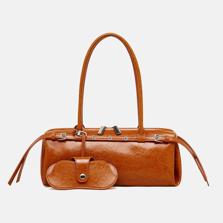 A brown faux-leather handbag with a single top handle, silver-tone hardware, and a matching small pouch placed in front, shown on a plain light gray background.