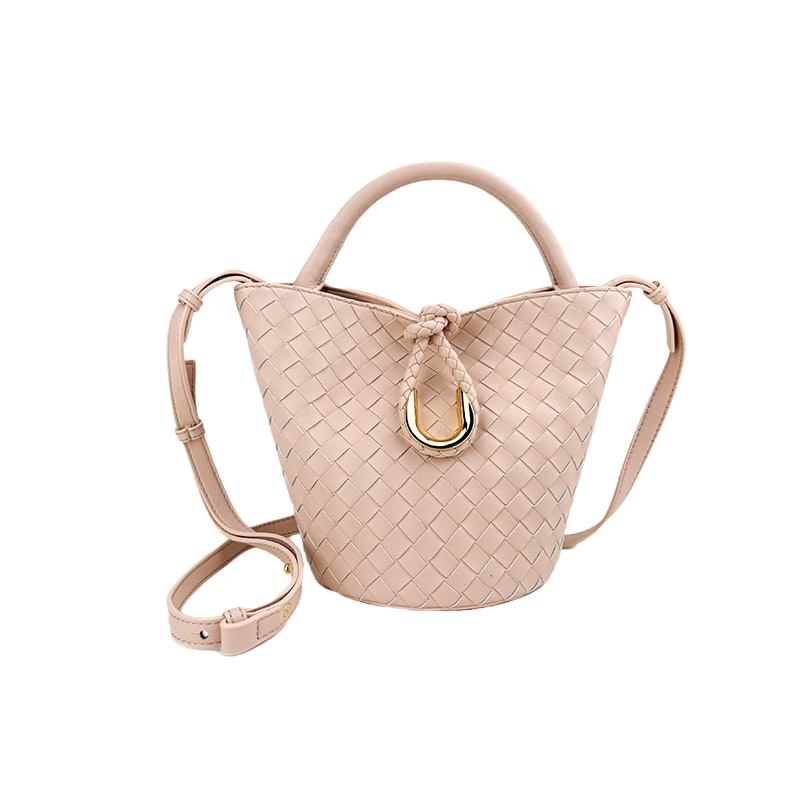 Woven leather bucket bag in blush pink with knot closure and crossbody strap