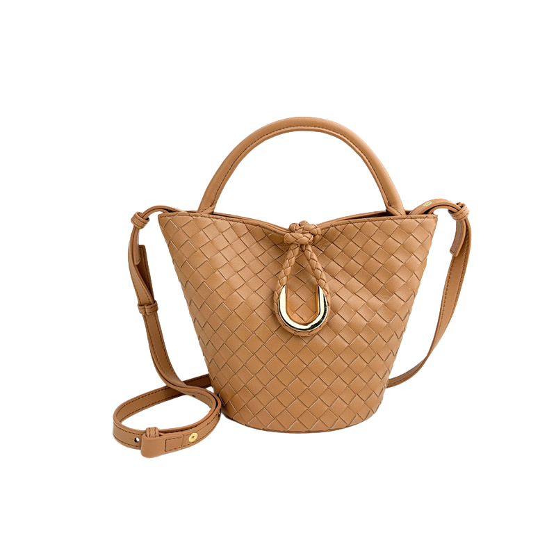 Woven leather bucket bag in camel — side profile with adjustable strap
