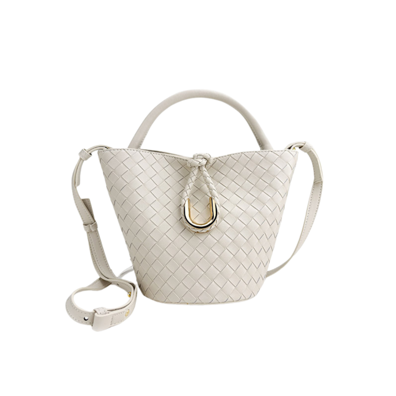 Woven leather bucket bag in chalk white — front view