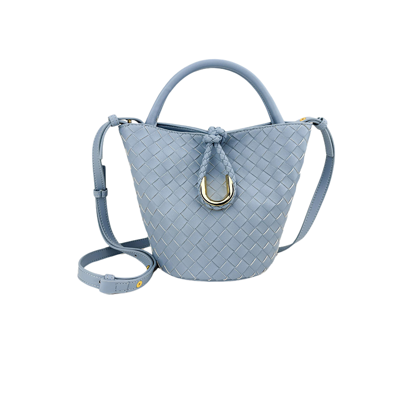 Woven leather bucket bag in light blue — front view