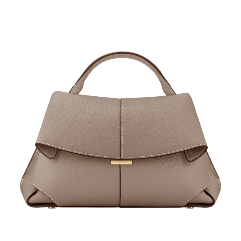 beige fold over leather bag with structured top handle front view
