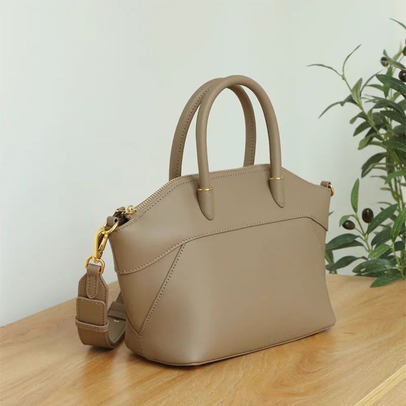 beige leather work tote with shoulder strap structured shape