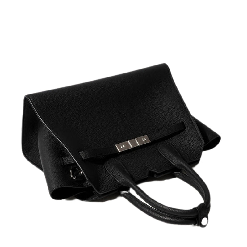 black leather top handle bag folded view zipper closure detail