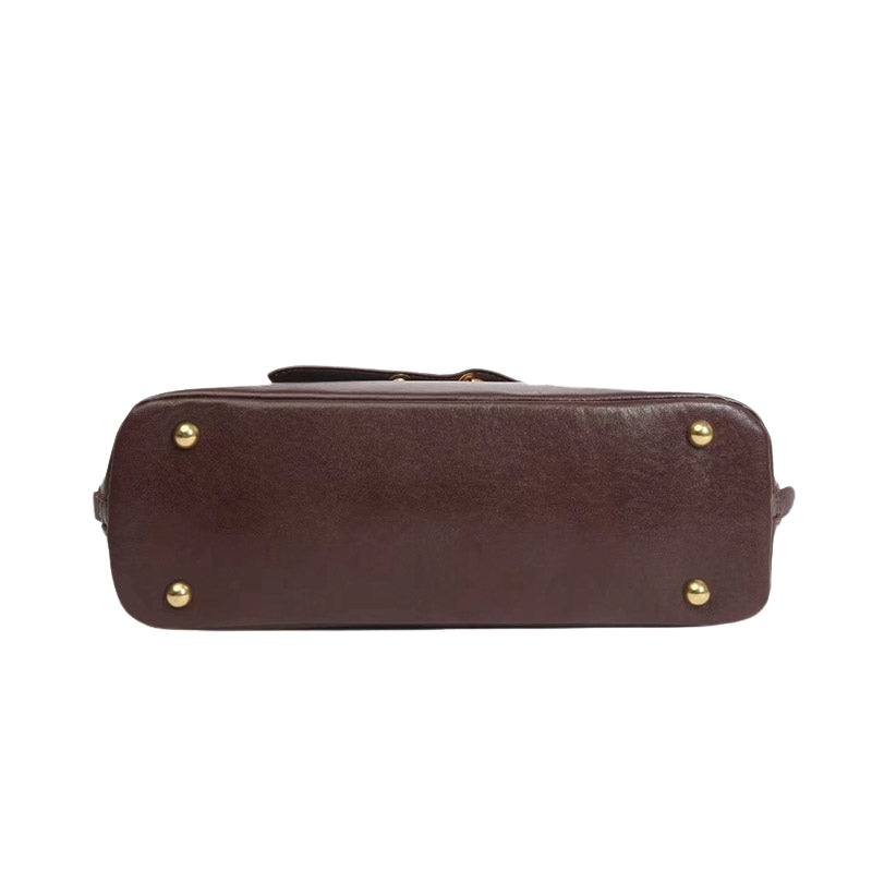 brown leather handbag base view structured bottom detail