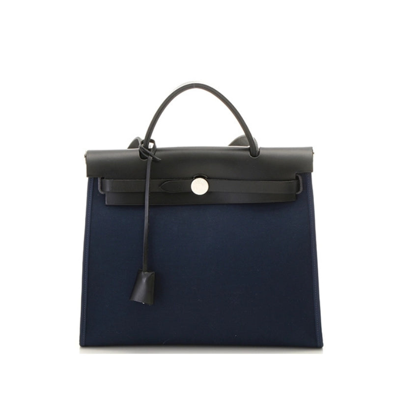 canvas crossbody top handle bag navy blue structured design