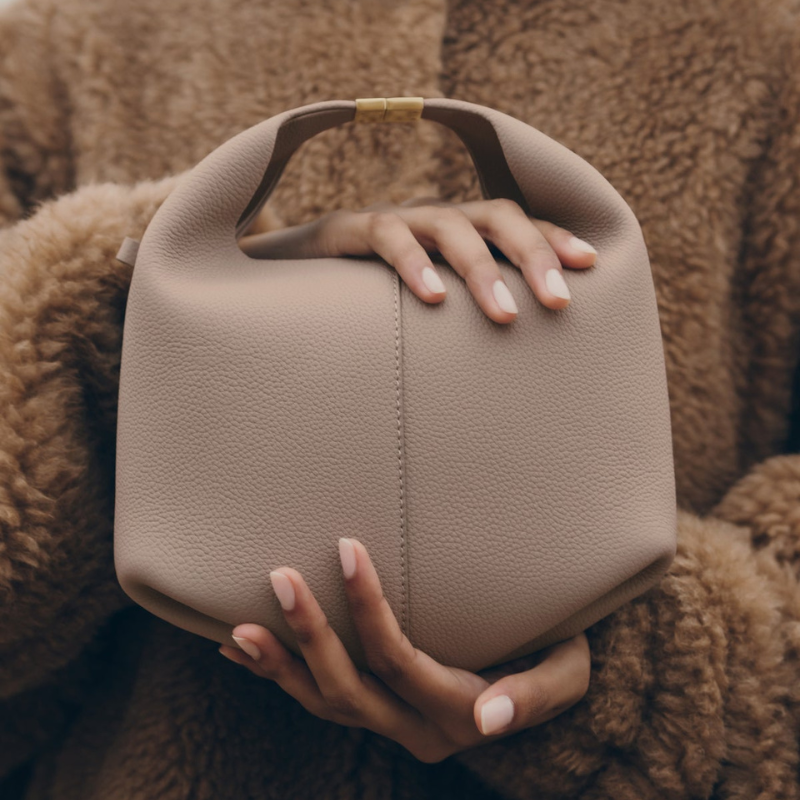 genuine calf leather dumpling bag detail showing soft texture and structure