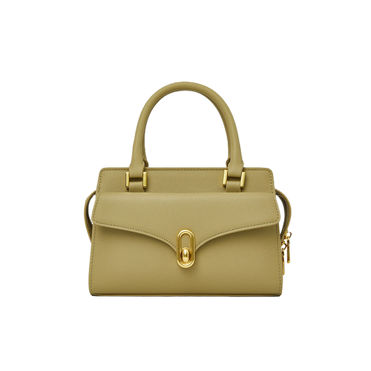 lock buckle leather crossbody bag in apricot color with top handle and structured design