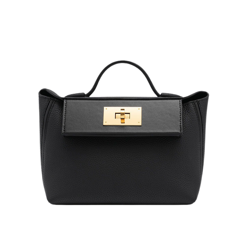 minimalist leather handbag in black with gold lock closure and top handle design
