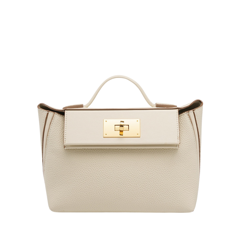 minimalist leather handbag in white with structured shape and elegant lock closure