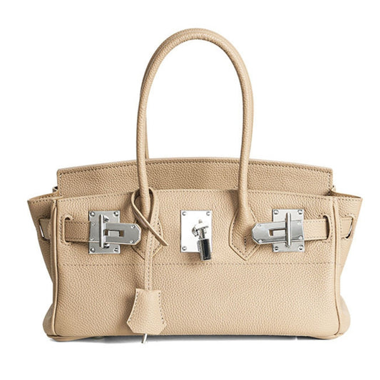 minimalist leather handbag with lock closure beige front view